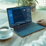 Freelancer working on a laptop at a desk, representing free AI tools for freelance work