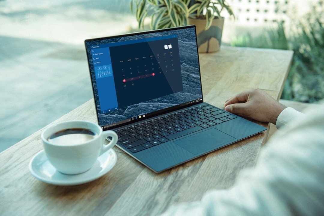 Freelancer working on a laptop at a desk, representing free AI tools for freelance work